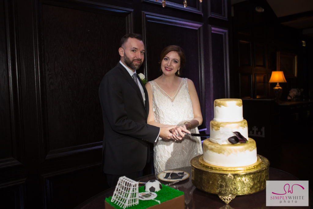 Nicole and Jason cutting the cake... made by Icing on the Top!