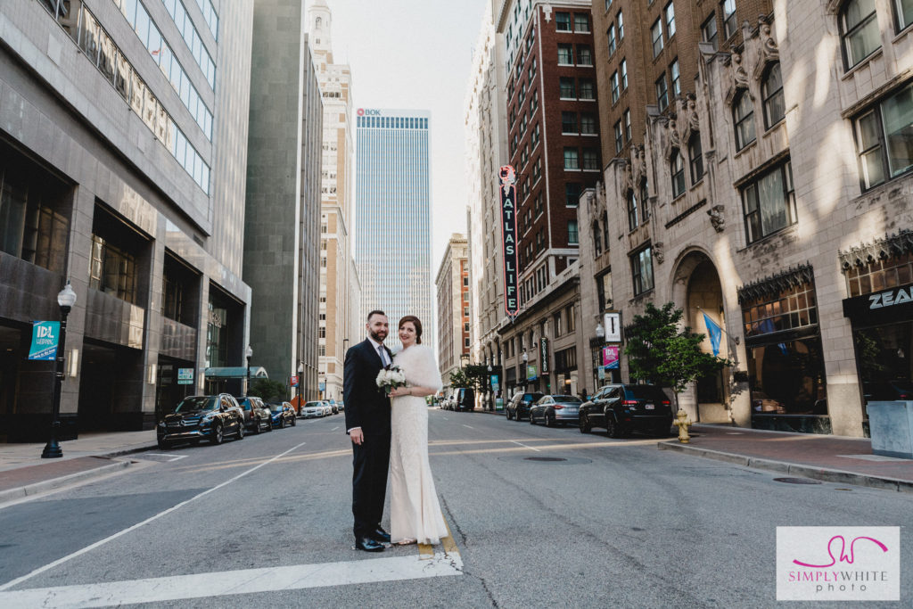 Nicole and Jason pose on Boston Avenue for their classic downtown Tulsa wedding photos!