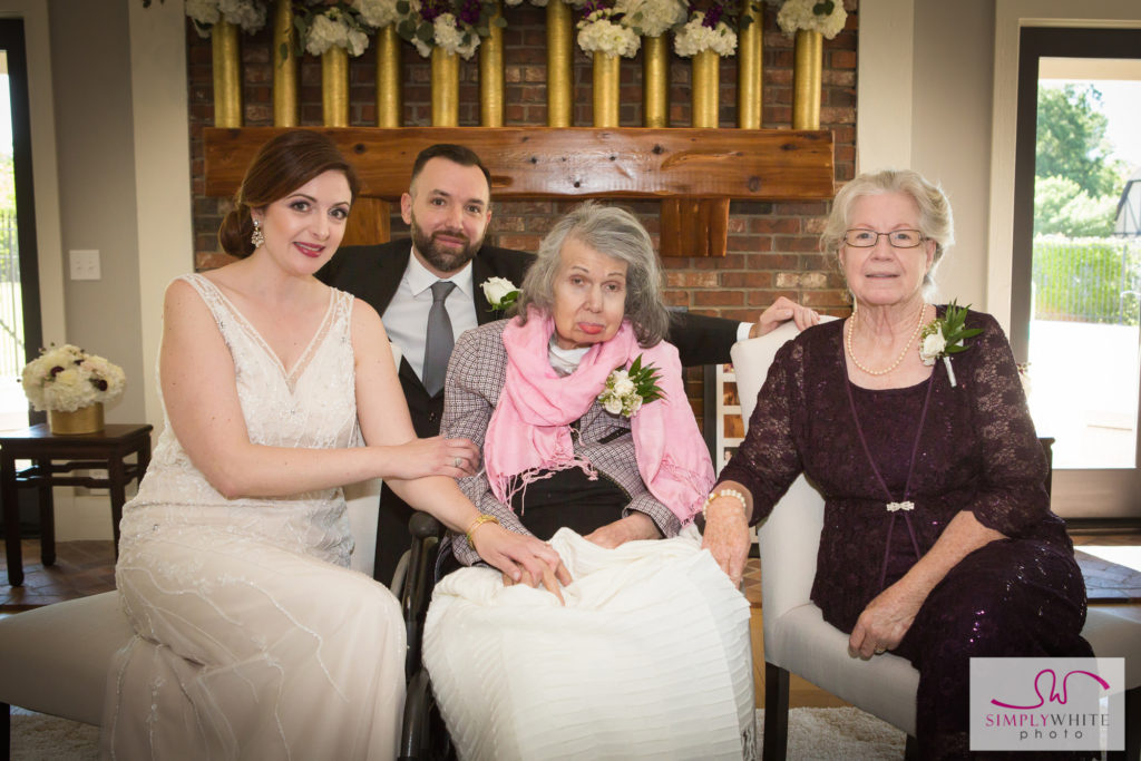 Nicole and Jason Tulsa wedding photos with their family at their 